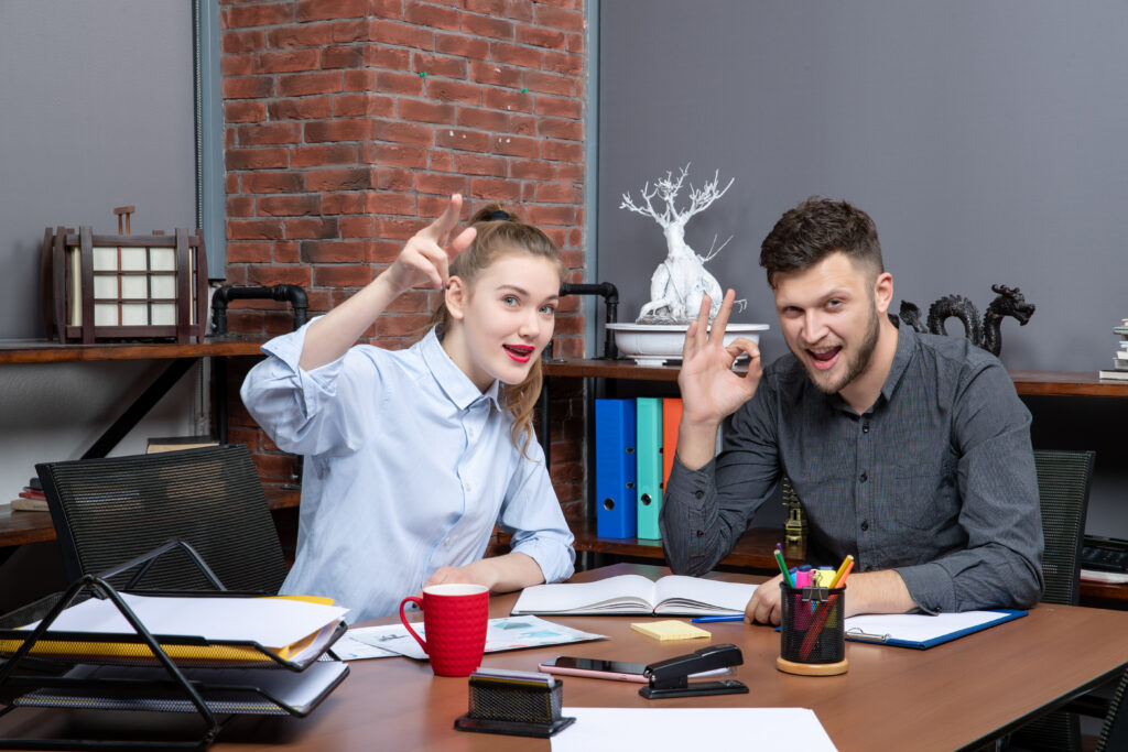 top view concentrated motivated skilled workers brainstorming one issue office top view concentrated motivated skilled workers brainstorming one issue office